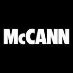 McCann logo on a black background.