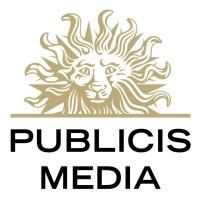 Publicis Media logo featuring a stylized sun with a face above a horizontal line and the words PUBLICIS MEDIA below.