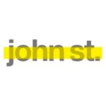 john st. logo: gray lowercase text with a yellow highlight bar across the middle on a white background