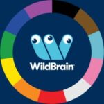 WildBrain logo: three blue stylized birds inside a dark blue circle, surrounded by a multicolored ring.