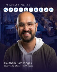 Portrait of Gautham Ram Pingali, Chief Media Officer at WPP Media, smiling against a city backdrop with a ‘I'M SPEAKING AT WPP STREAM’ banner above.